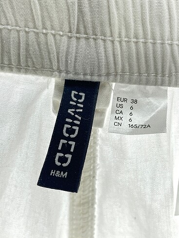 38 Beden beyaz Renk H&M Kumaş Pantolon %70 İndirimli.