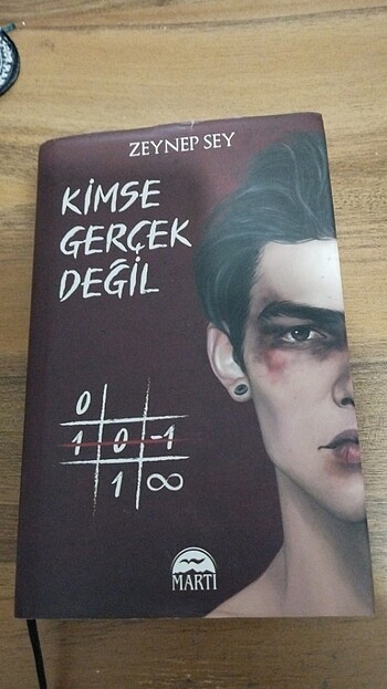 kimse gerçek değil ciltli
