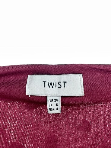 34 Beden çeşitli Renk Twist Midi Etek %70 İndirimli.
