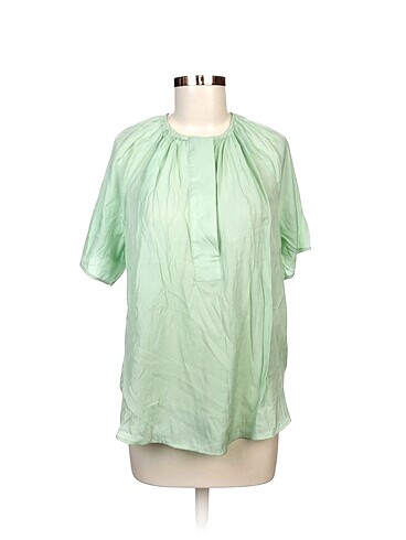 H&M Bluz %70 İndirimli.