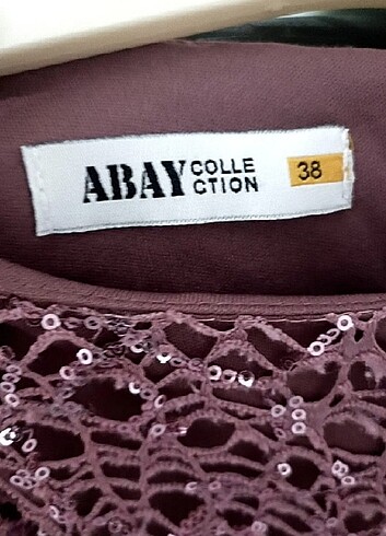38 Beden pembe Renk Pembe simli uzun elbise 38 beden kemeri yanındadır SATILIKTIR