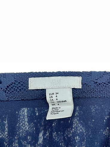 34 Beden lacivert Renk H&M Midi Etek %70 İndirimli.