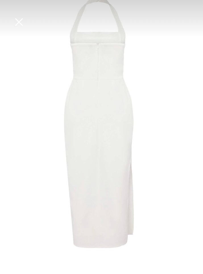 Beyaz Astarlı Vücuda Oturan Yırtmaç
Detaylı Midi Dokuma Elbise - Görsel 4