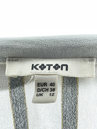 40 Beden beyaz Renk Koton Bluz %70 İndirimli.
