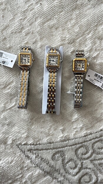 Cartier Smal kadın saati ortadaki ürün