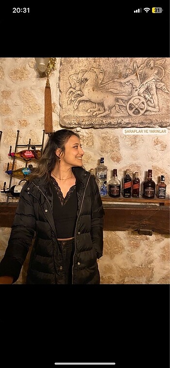 Uzun yanları fermuarlı şişme mont