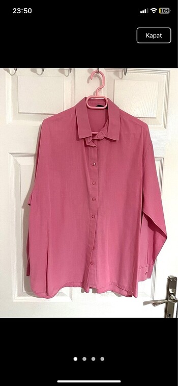 Pembe keten gömlek