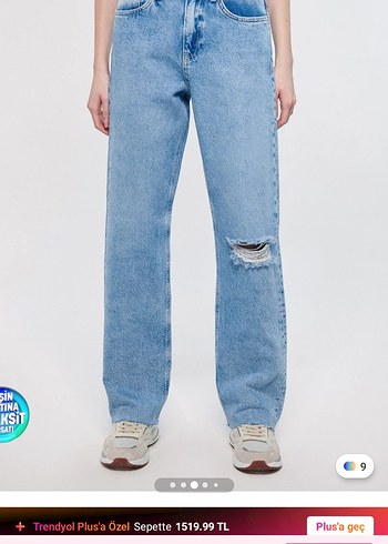 Kadın Mavi Bol Kesim Yırtık Denim Pantolon