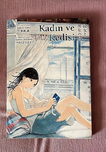Kadın ve kedisi