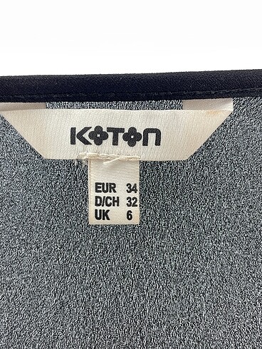 34 Beden çeşitli Renk Koton Bluz %70 İndirimli.