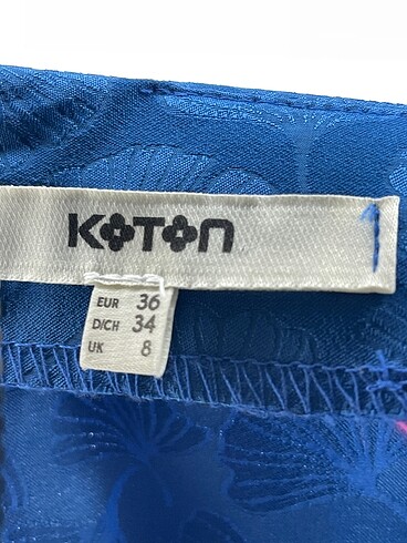 36 Beden çeşitli Renk Koton Midi Etek %70 İndirimli.