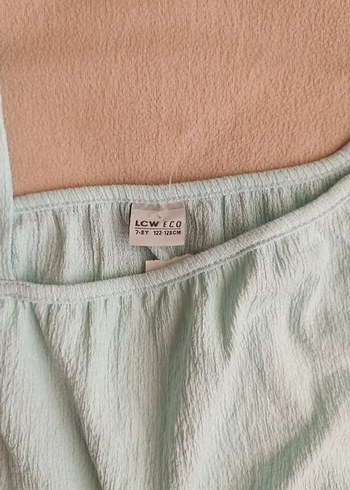 LC Waikiki Kız Çocuk Turkuaz Kolsuz Keten Bluz