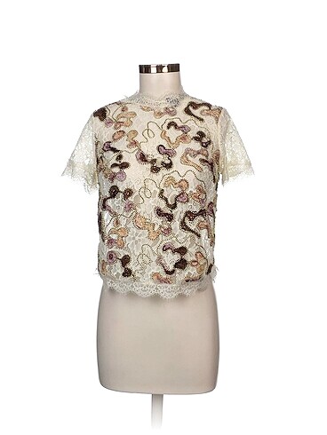 Zara Bluz %70 İndirimli.
