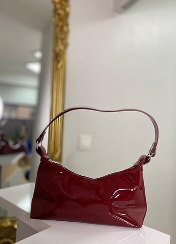 Bordo rugan baget kadın kol çantası