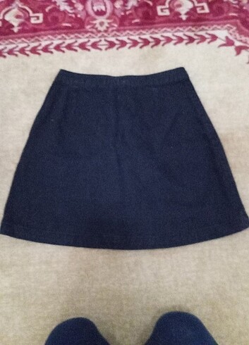 H&M H&M marka dümeli mini kot etek