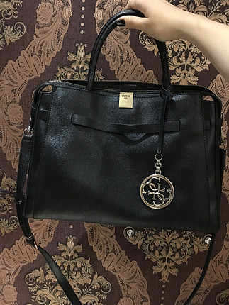 Guess canta