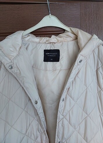 Kapüşonlu Kapitone Mont - Görsel 9