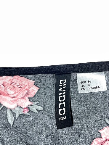 36 Beden siyah Renk H&M Kısa Tulum %70 İndirimli.