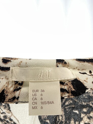 36 Beden çeşitli Renk H&M Kısa Elbise %70 İndirimli.