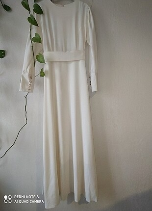 38 Beden Süt beyazı kemerli kol detaylı uzun elbise