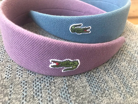 Lacoste taç