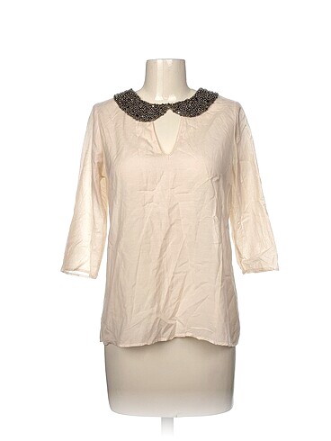 Zara Bluz %70 İndirimli.