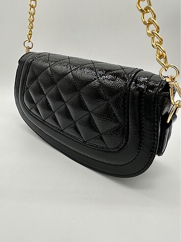 Yves Saint Laurent YSL desenli oval çanta rugan