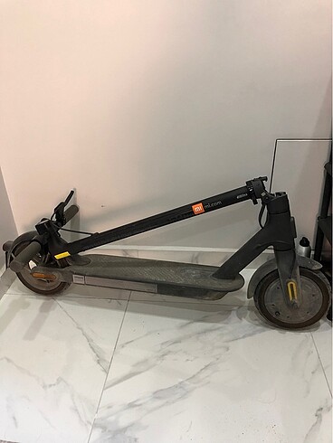  Elektrikli scooter