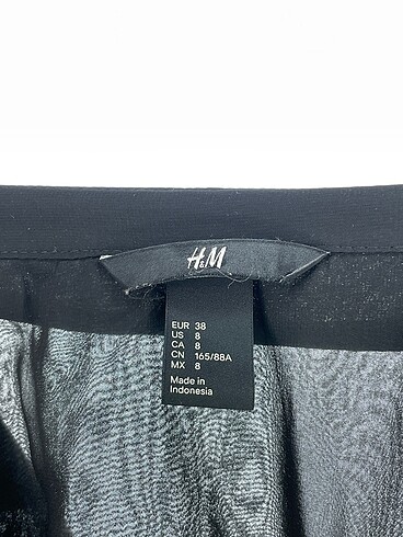 38 Beden siyah Renk H&M Gömlek %70 İndirimli.