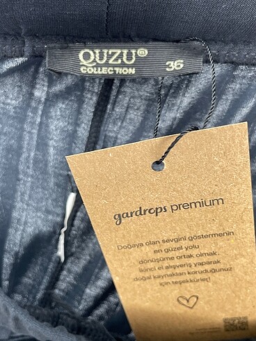36 Beden siyah Renk Quzu Düz Kesim %70 İndirimli.