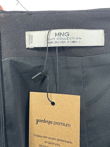 34 Beden siyah Renk Mango Midi Etek %70 İndirimli.