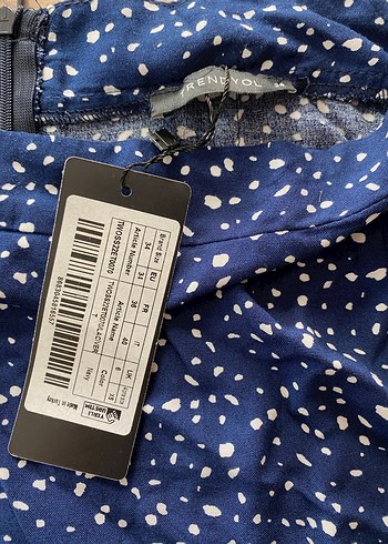 Beyaz desenli lacivert yırtmaçlı midi boy etek - Görsel 2