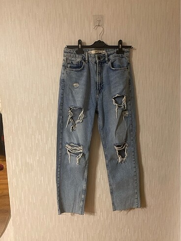 yırtık kesin kot pantolon