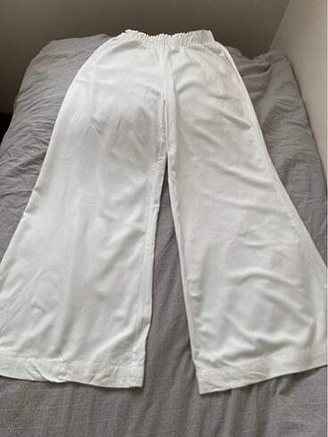 Stradivarius Dökümlü keten karışımlı plazzo pantolon