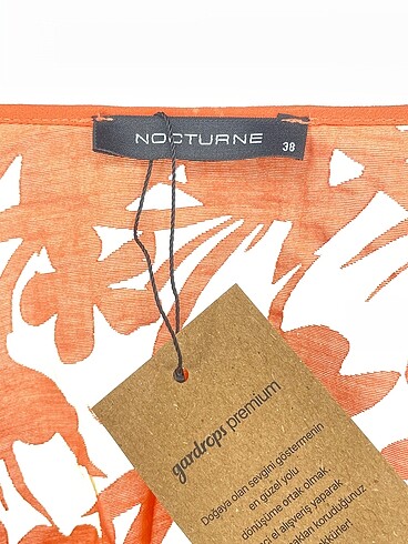 38 Beden turuncu Renk Nocturne Bluz %70 İndirimli.
