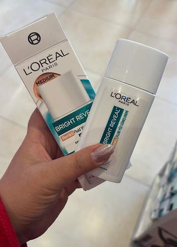 L'Oréal Bright Reveal Renkli Güneş Kremi SPF 50 Medium - Görsel 3