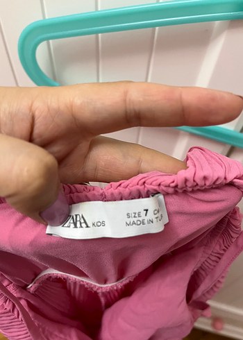 Pembe zara tulum üstte duruşu çok güzel - Görsel 2