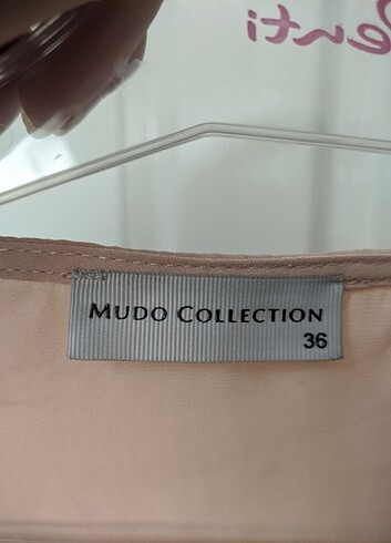 Mudo Mudo Üst