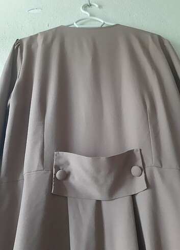m Beden Kap, Tunik