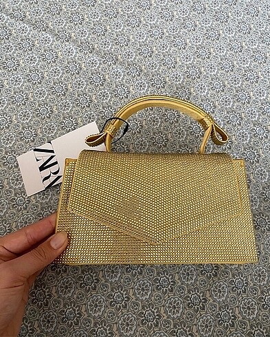 Zara gold taşlı çanta