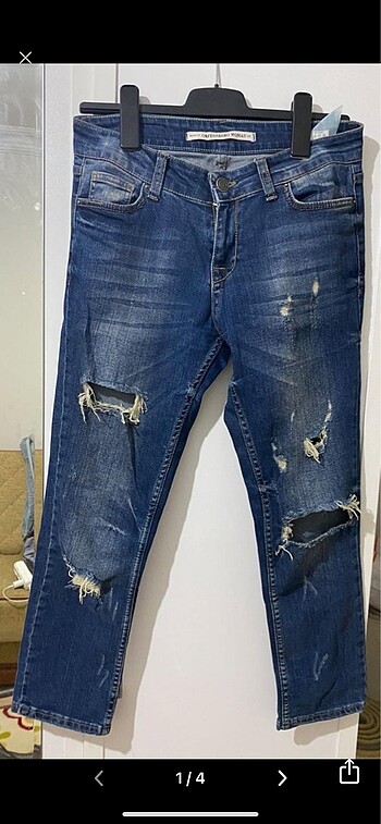 Yırtık kot pantolon