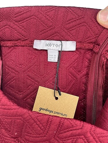 34 Beden bordo Renk Koton Mini Etek %70 İndirimli.