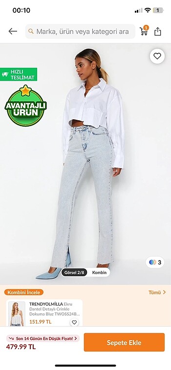 Trendyol & Milla Mavi yırtmaçlı yüksek bel flare jeans