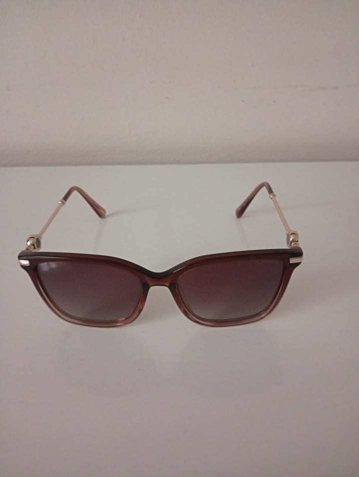 Osse Kadın güneş gözlüğü
Klasik Bej Tokalı Kadın Güneş Gözlüğü - Görsel 2