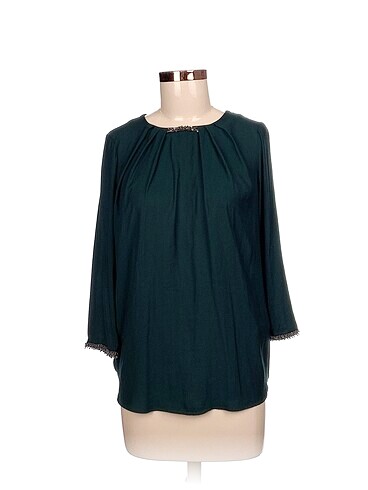 Zara Bluz %70 İndirimli.