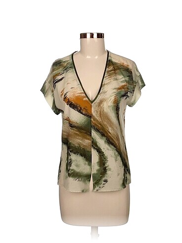 Zara Bluz %70 İndirimli.