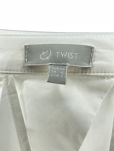 34 Beden beyaz Renk Twist Gömlek %70 İndirimli.