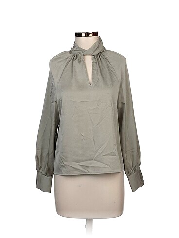 Zara Bluz %70 İndirimli.