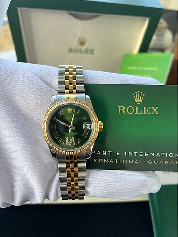 Rolex Kadın Saati 36 mm gümüş,gold içi taşlı yeşil