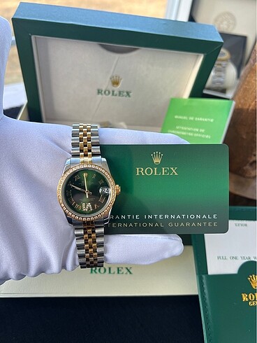 Rolex Rolex Kadın Saati 36 mm gümüş,gold içi taşlı yeşil